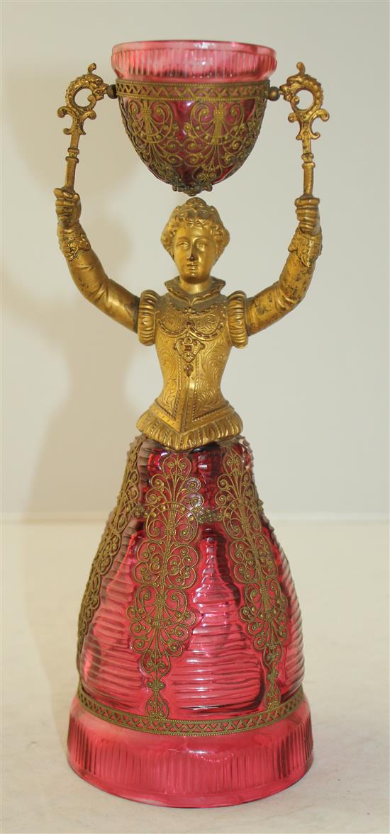 A German ruby glass and gilt metal figural marriage cup, probably Fritz Heckert, late 19th century, 26.5cm